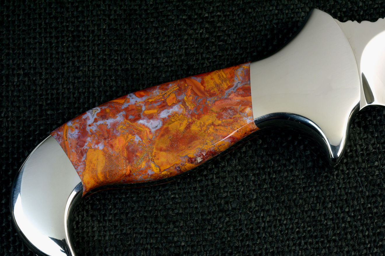 "Macha Navigator" obverse side view in 440C high chromum T3 cryogenically processed stainless steel blade, 304 austenitic stainless steel bolsters, Roostertail Agate gemstone handle, hand-carved, hand-dyed leather sheath